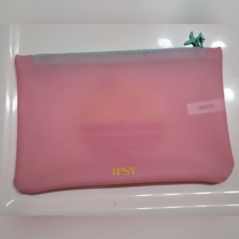IPSY Pink Escape Cosmetic Bag With Airplane Zipper Pull